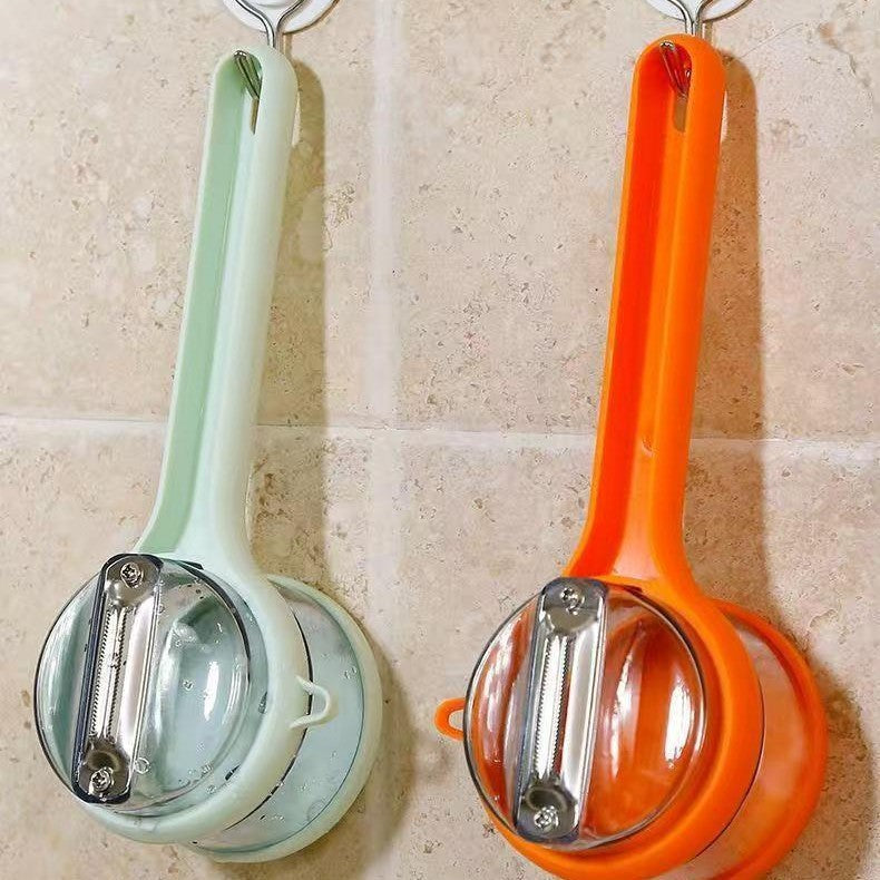 Vegetable Peeler with Built-In Peel Catcher
