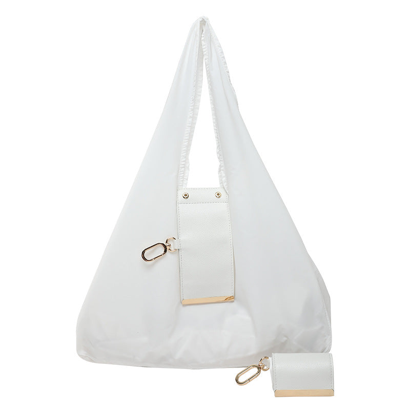 Tiny as a Keychain, Holds Up to 30 lbs! The Ultimate Everyday Foldaway